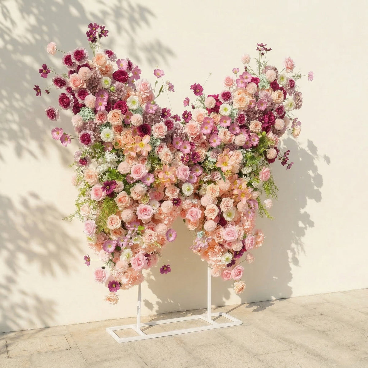 Lumeria: Exquisite Blush & Berry Butterfly-Shaped Flower Wall for Luxury Events & Parties Backdrop